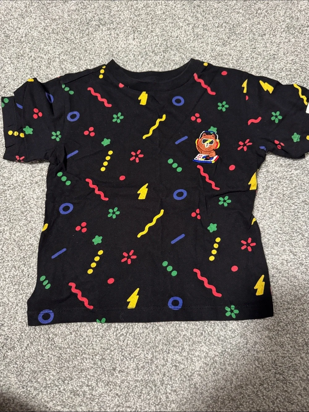 FRIENDS Black Tee with Multicolor Playful Shapes